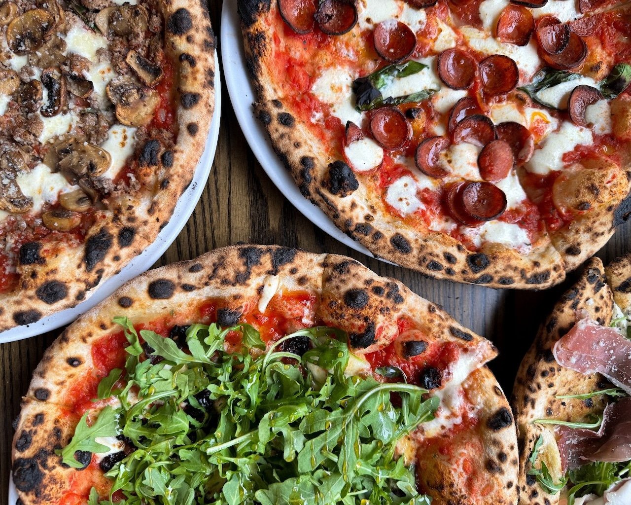 Pizzeria Veritas signature dishes Margherita PizzaPizza MacellaiaCapricciosa Pizza